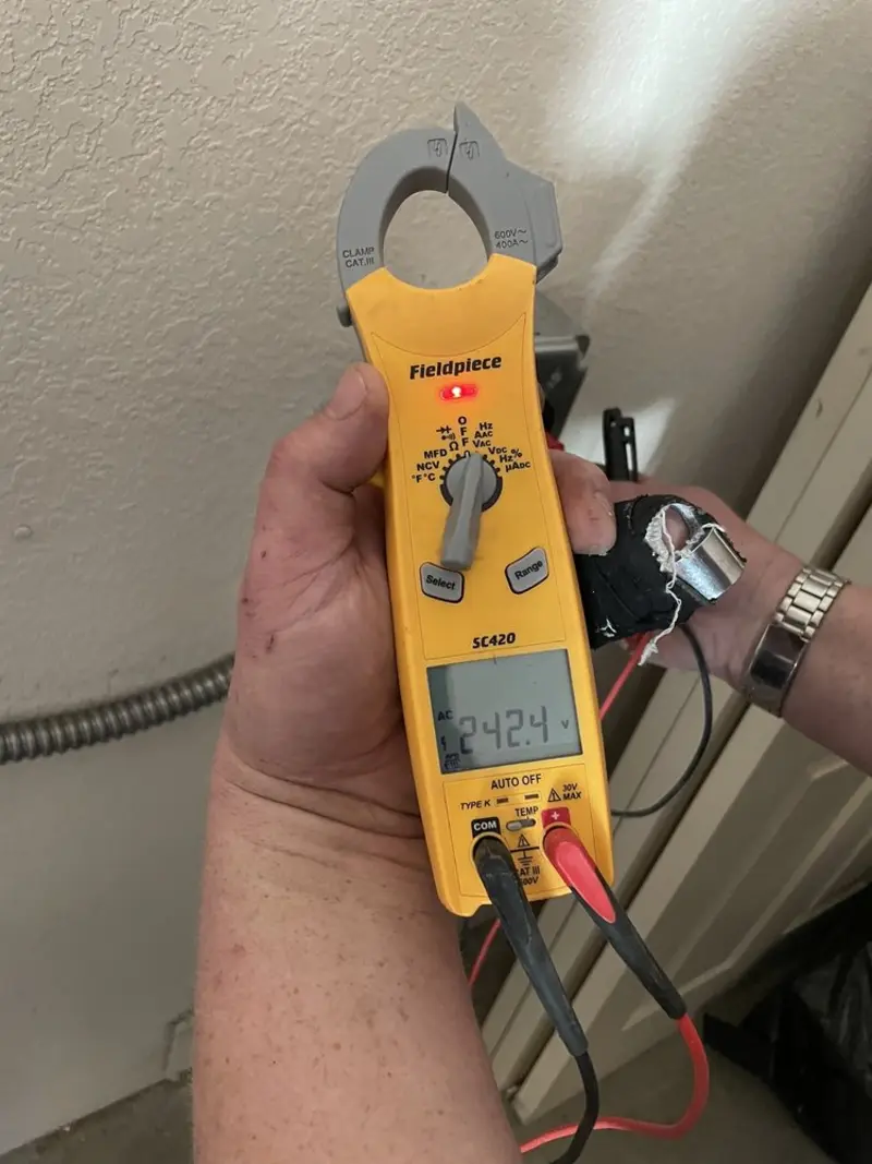 Voltage testing with clamp meter during Ceiling Fan Installation in Arcadia
